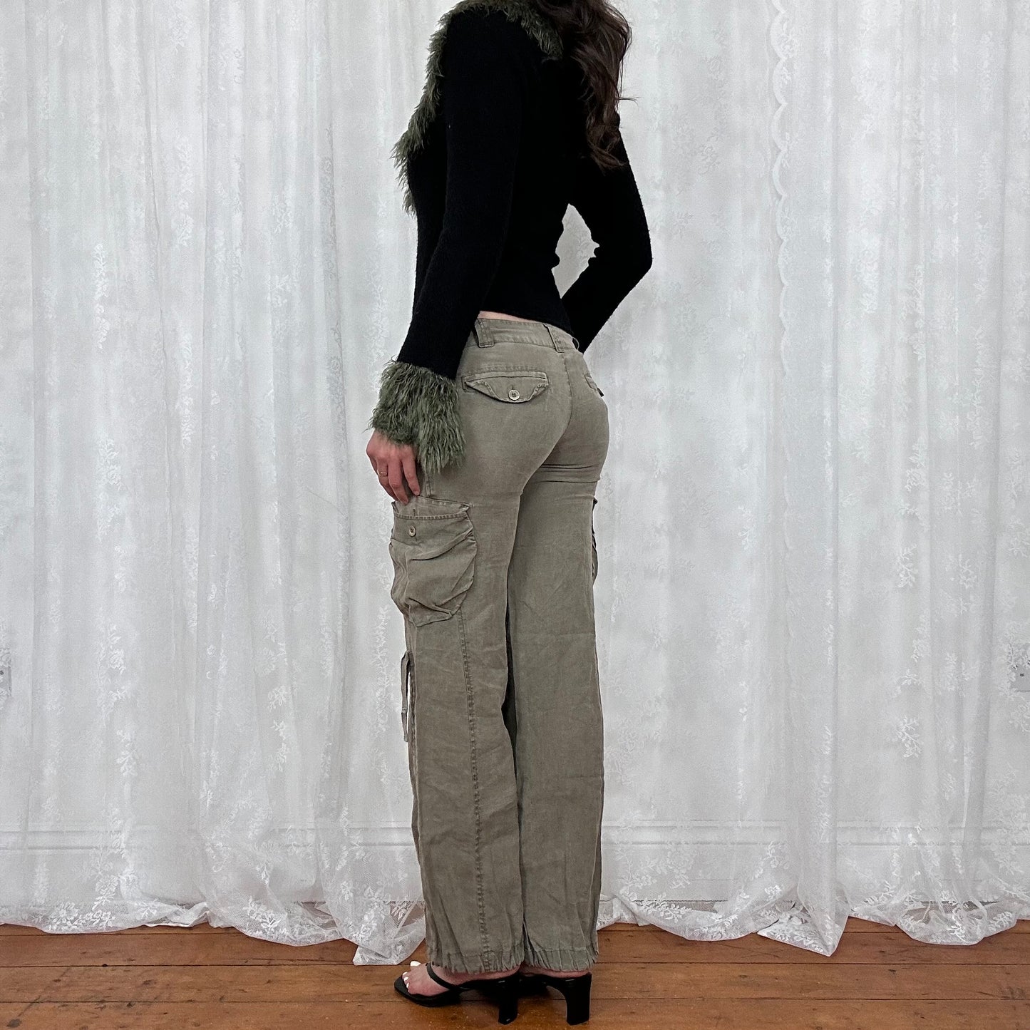 vintage 00s black knit long sleeve with green fur trim
