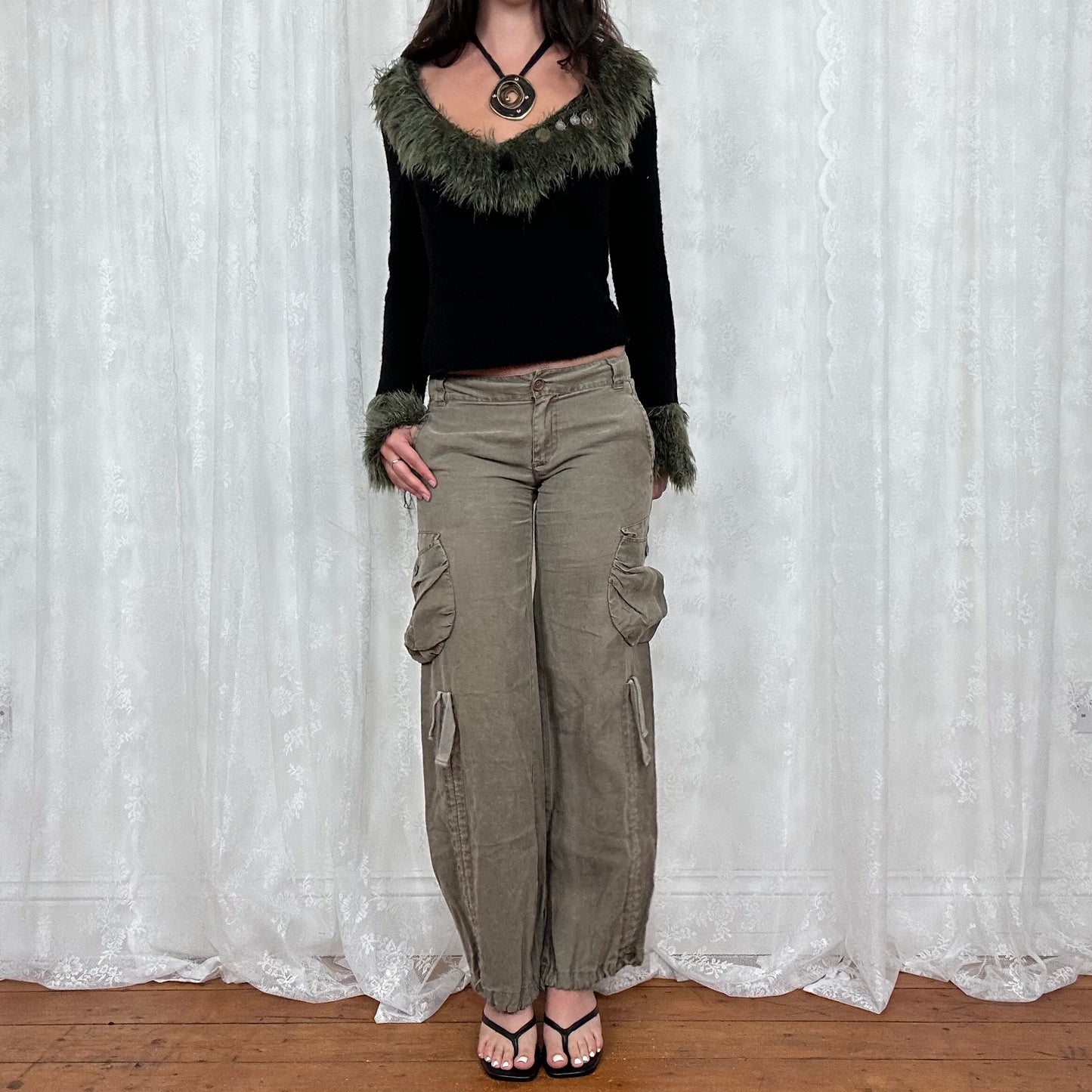 vintage 00s black knit long sleeve with green fur trim