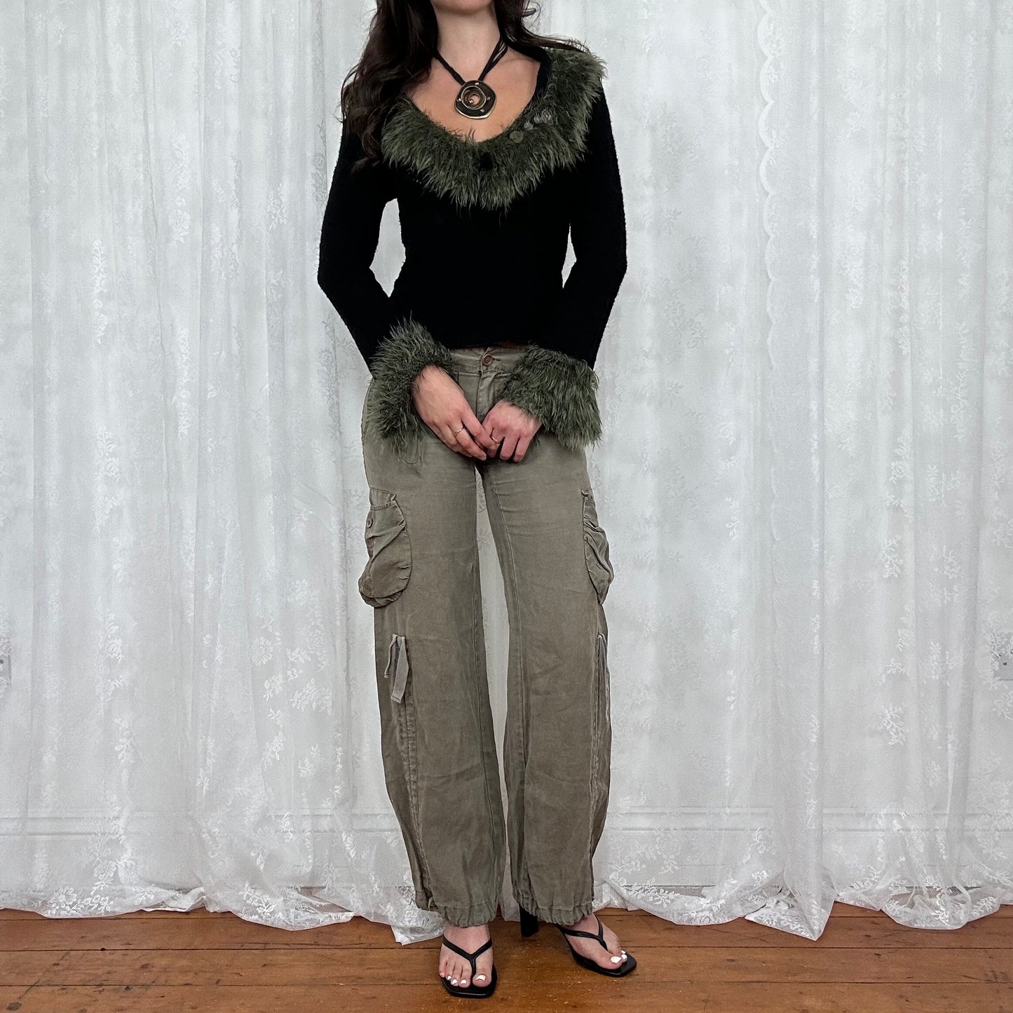vintage 00s black knit long sleeve with green fur trim