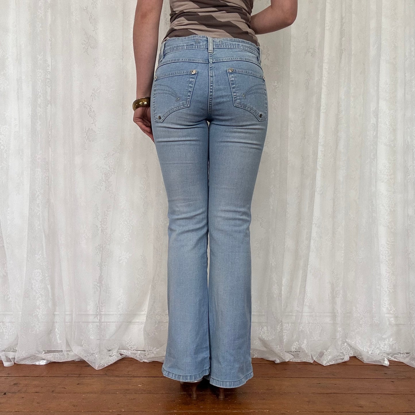 vintage 00s light wash denim flared jeans