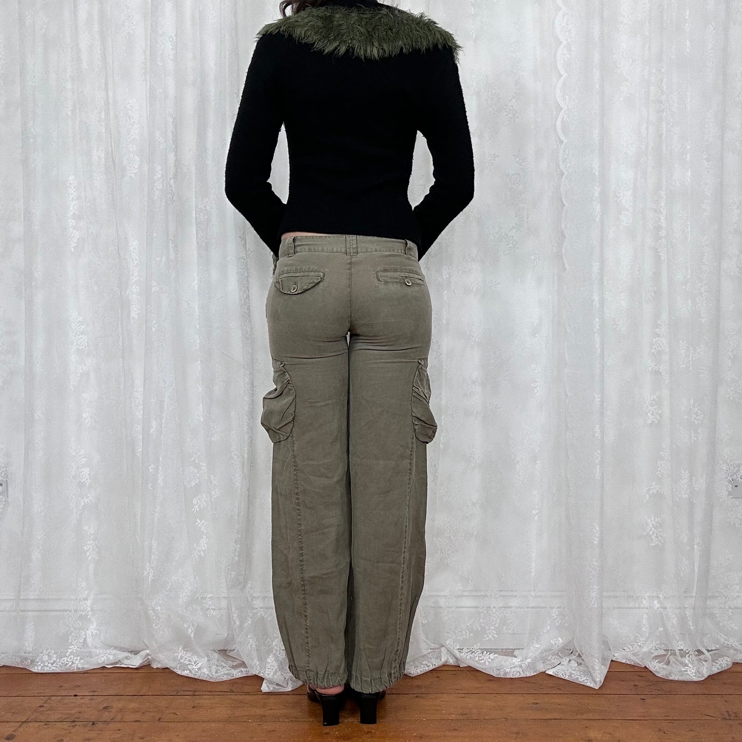 vintage 00s black knit long sleeve with green fur trim