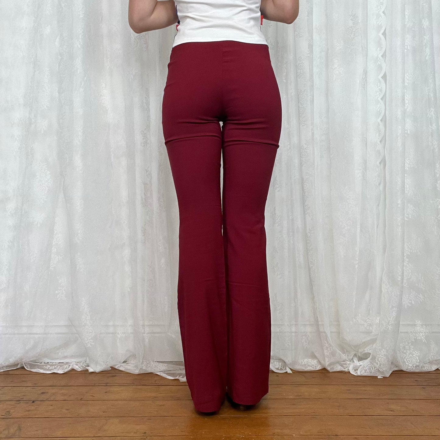 vintage 00s red flared trousers with front zip