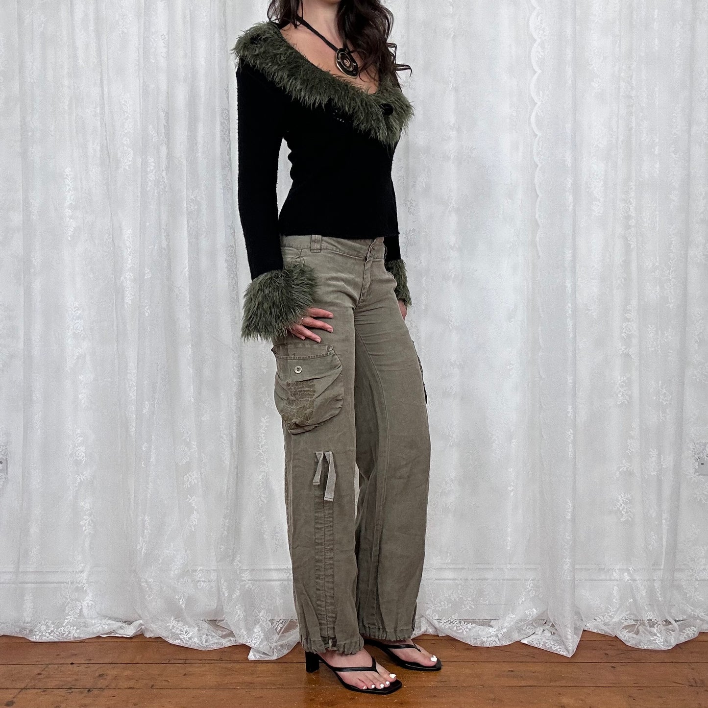 vintage 00s black knit long sleeve with green fur trim