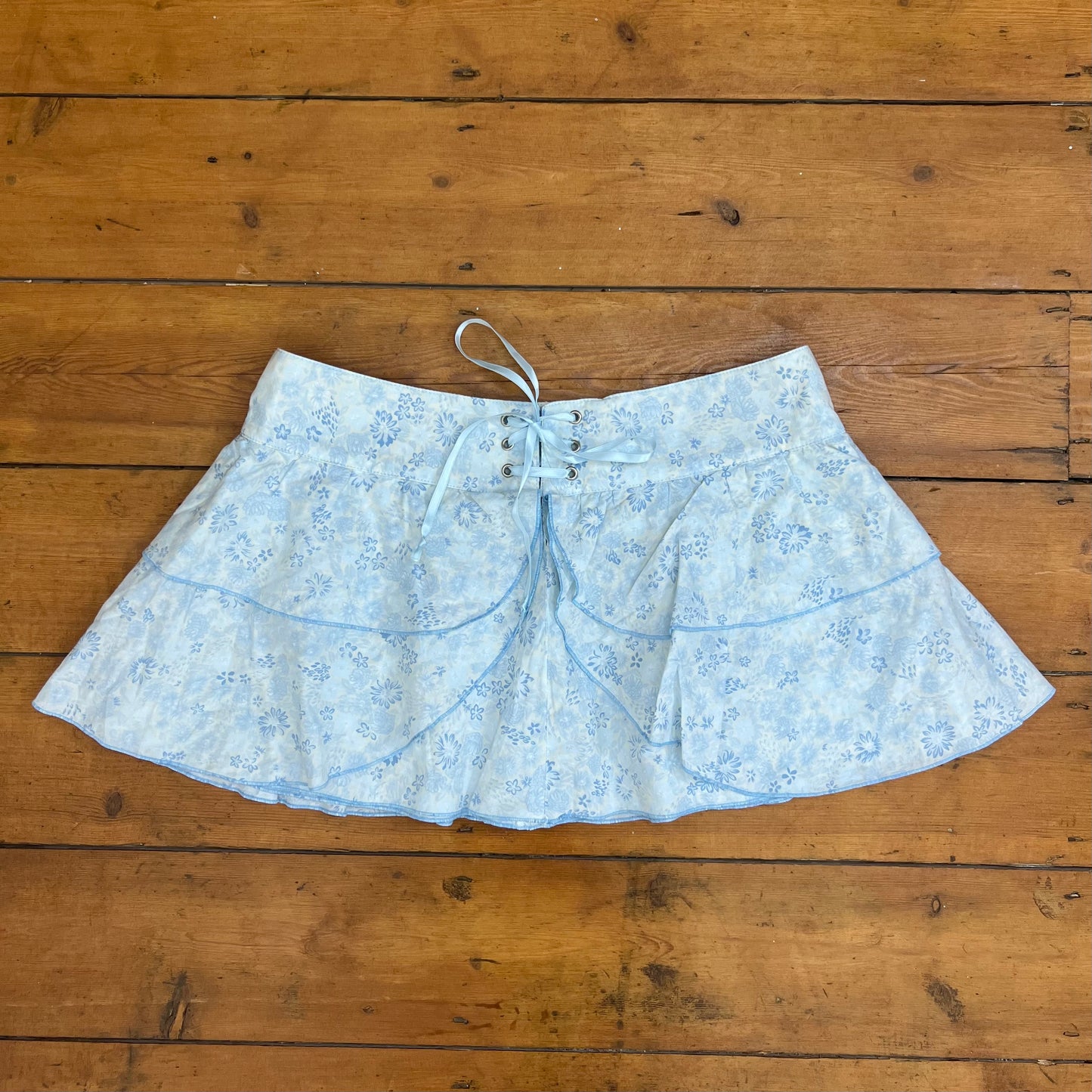 vintage 00s white and blue ruffle mini skirt with lace up detail