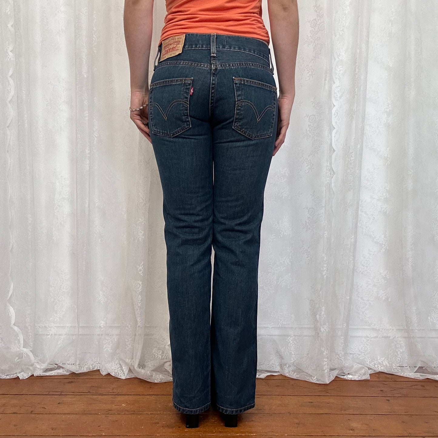 vintage 00s dark wash low rise Levi’s jeans