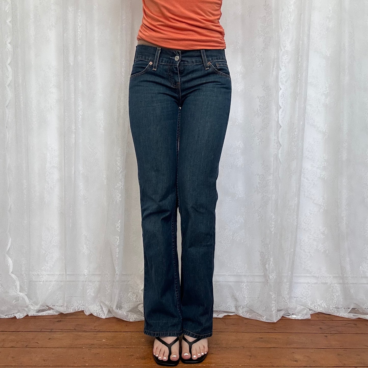 vintage 00s dark wash low rise Levi’s jeans