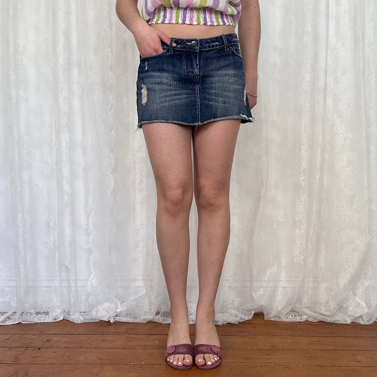 vintage 00s dark wash denim distressed mini skirt