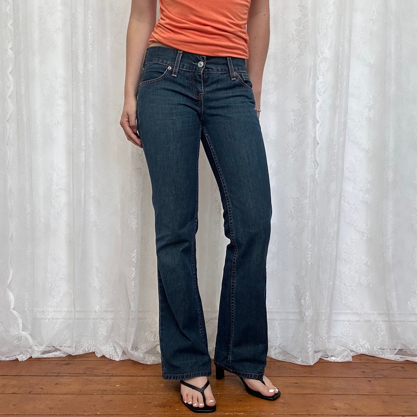 vintage 00s dark wash low rise Levi’s jeans