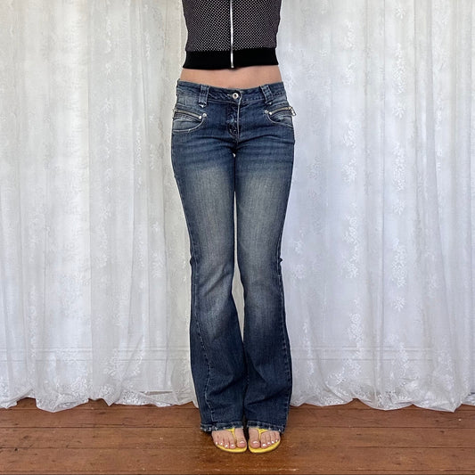 vintage 00s mid wash low rise flared leg jeans