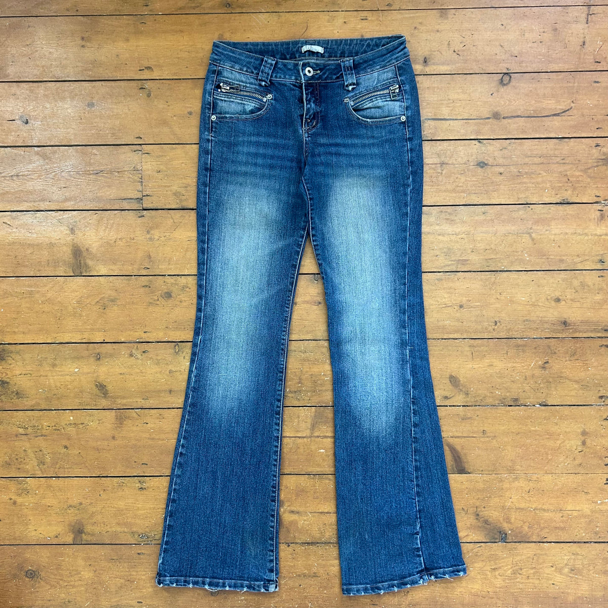 vintage 00s mid wash low rise flared leg jeans