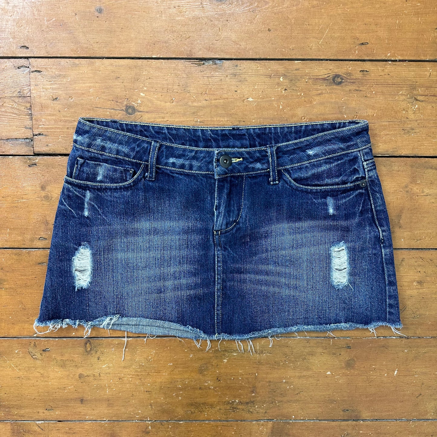 vintage 00s dark wash denim distressed mini skirt