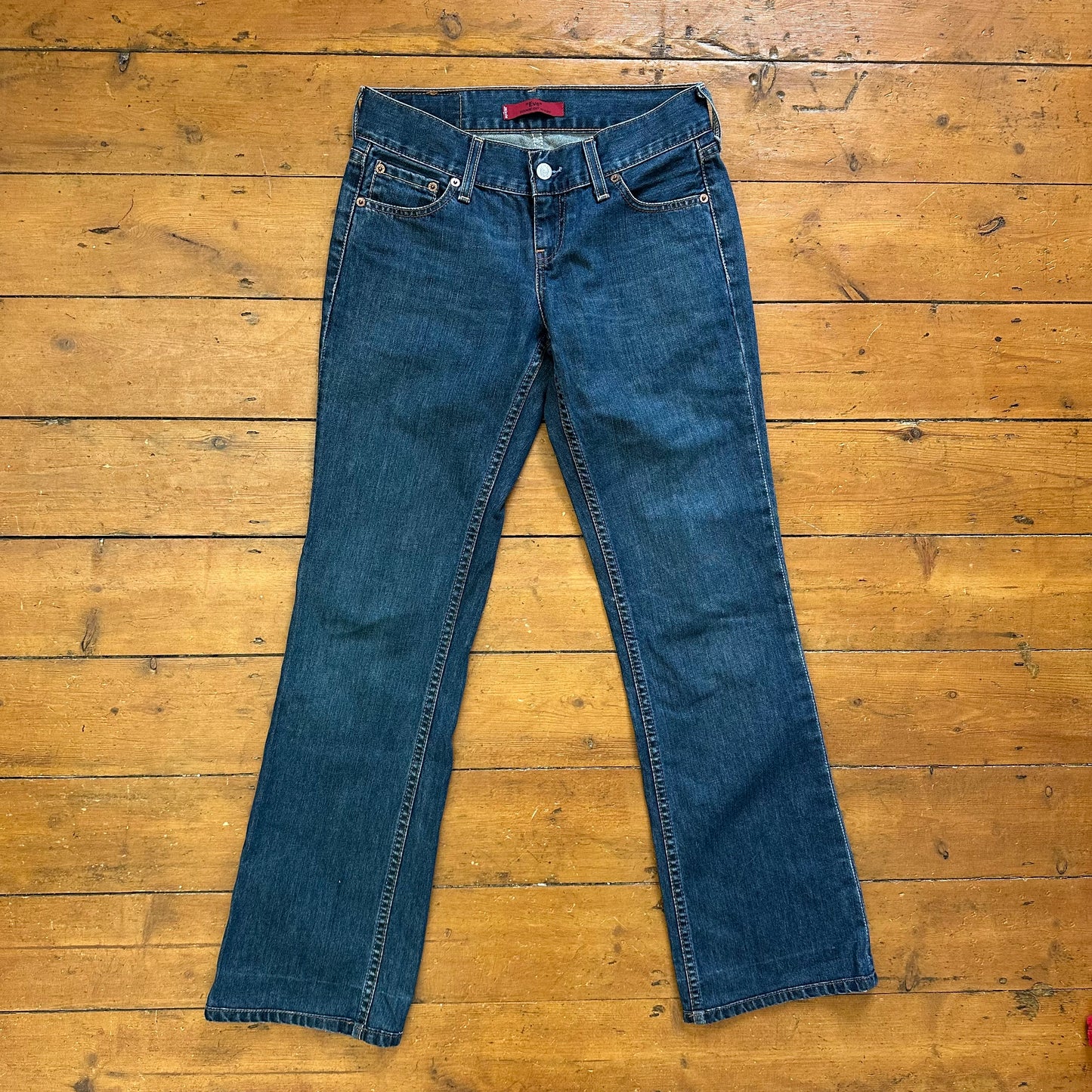 vintage 00s dark wash low rise Levi’s jeans