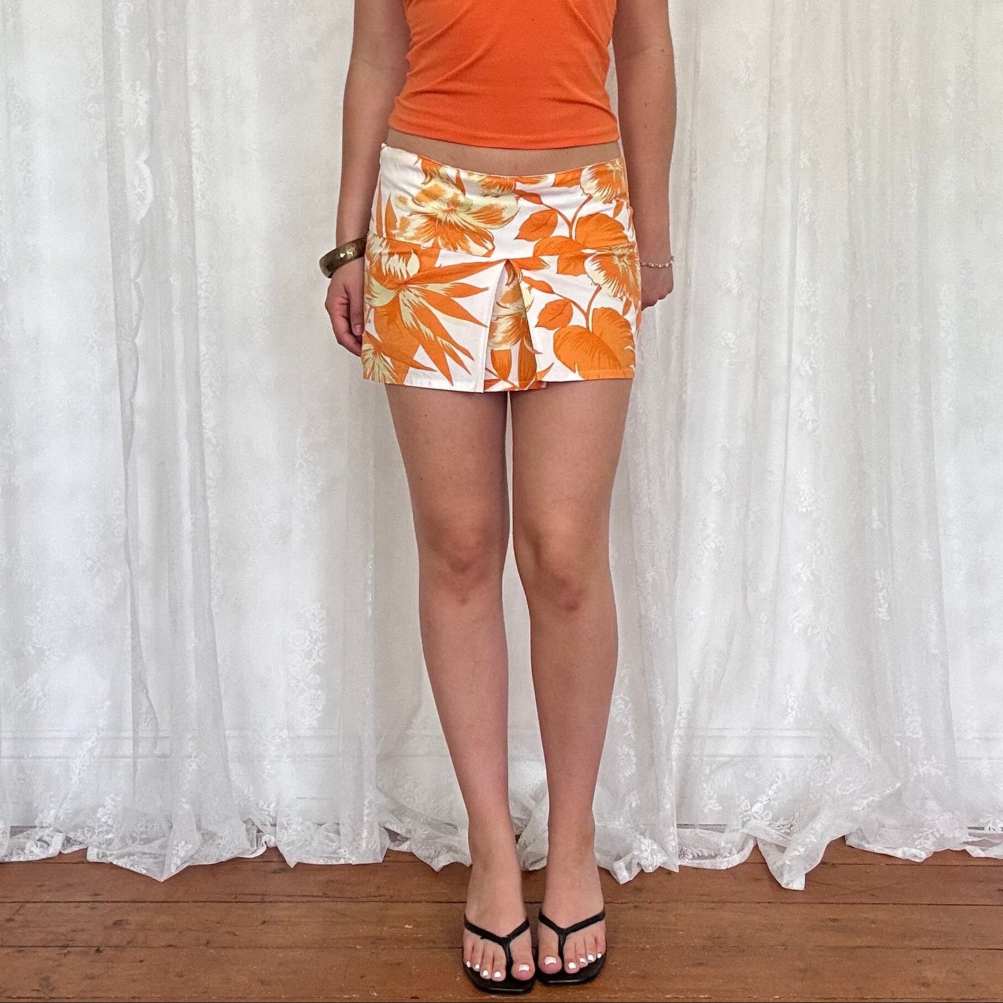 vintage 00s orange hibiscus floral mini skirt