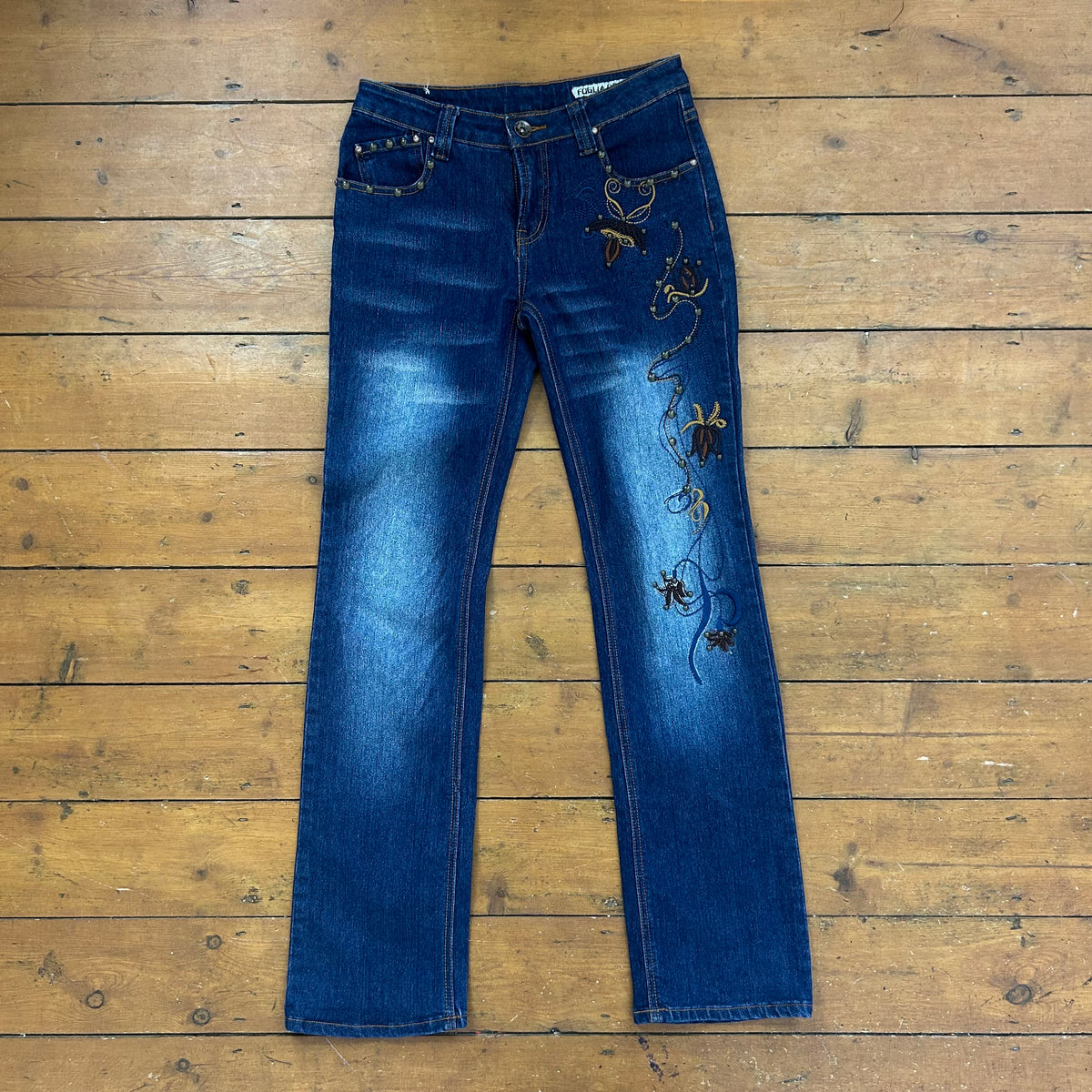 vintage 00s dark wash straight leg jeans with studs and embroidery