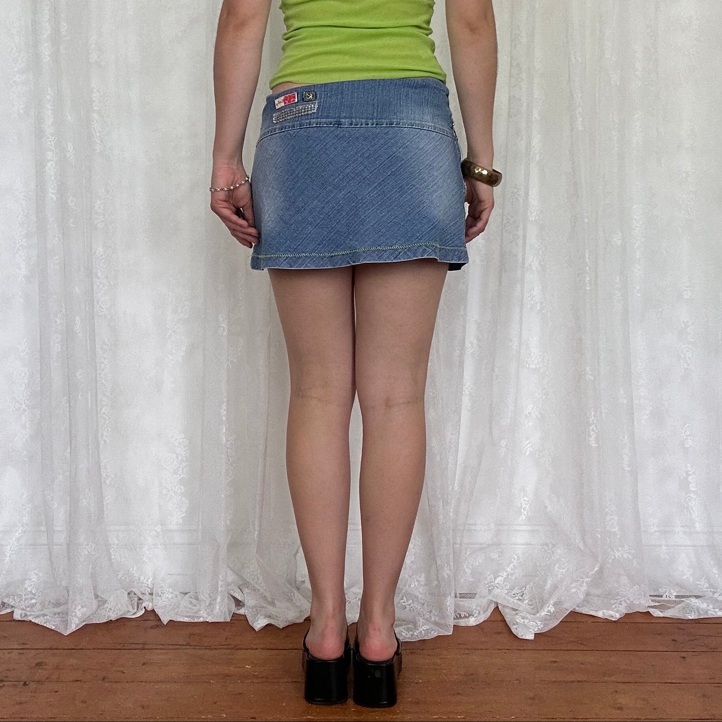vintage 00s denim a line mini skirt with green zip detail
