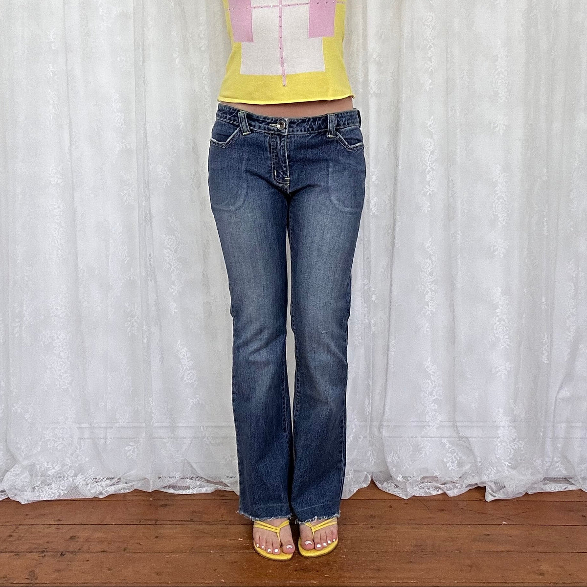 vintage 00s dark wash low rise bootleg jeans with back pocket embroidery