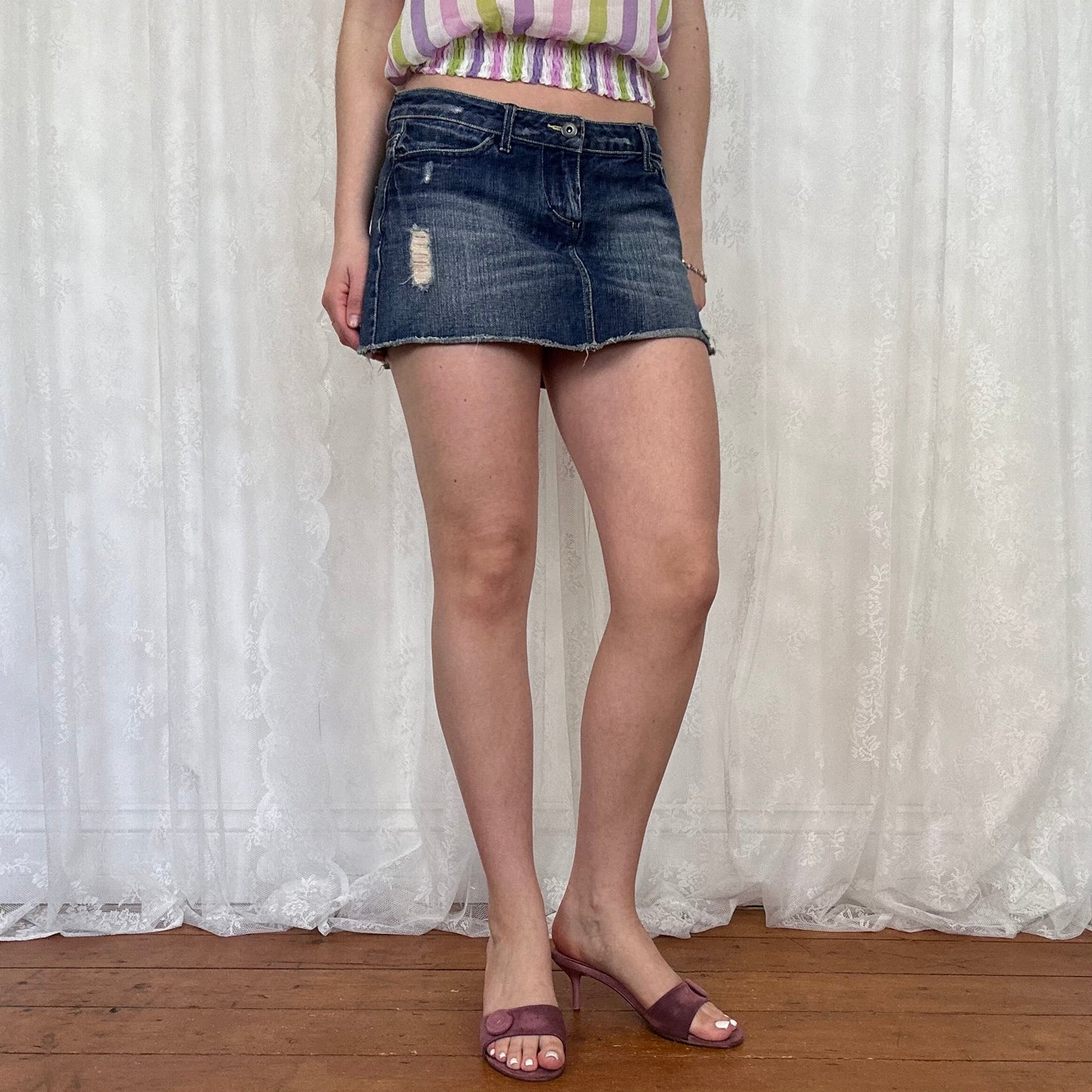 vintage 00s dark wash denim distressed mini skirt