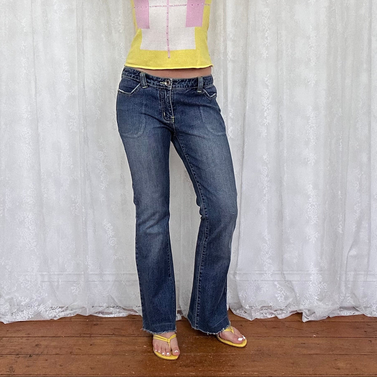vintage 00s dark wash low rise bootleg jeans with back pocket embroidery