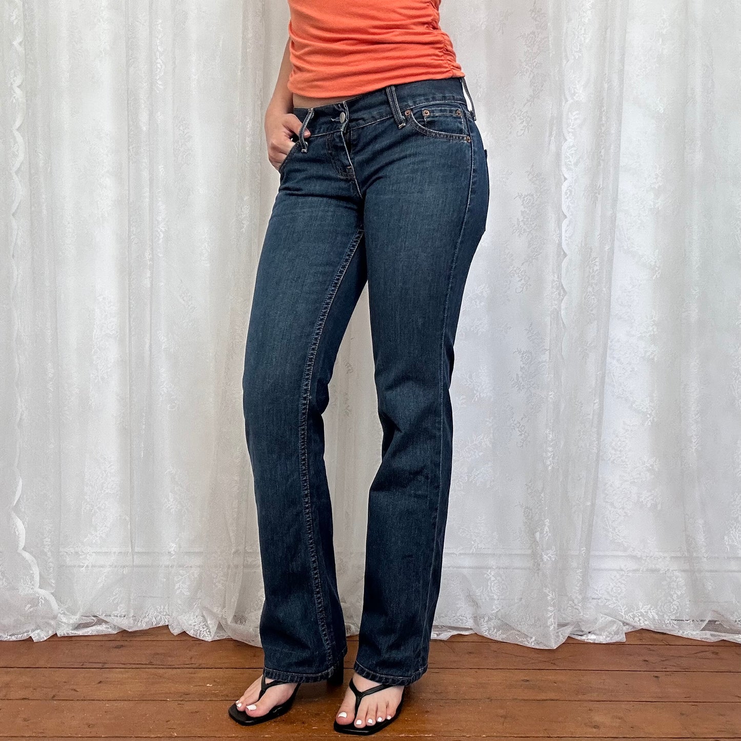 vintage 00s dark wash low rise Levi’s jeans