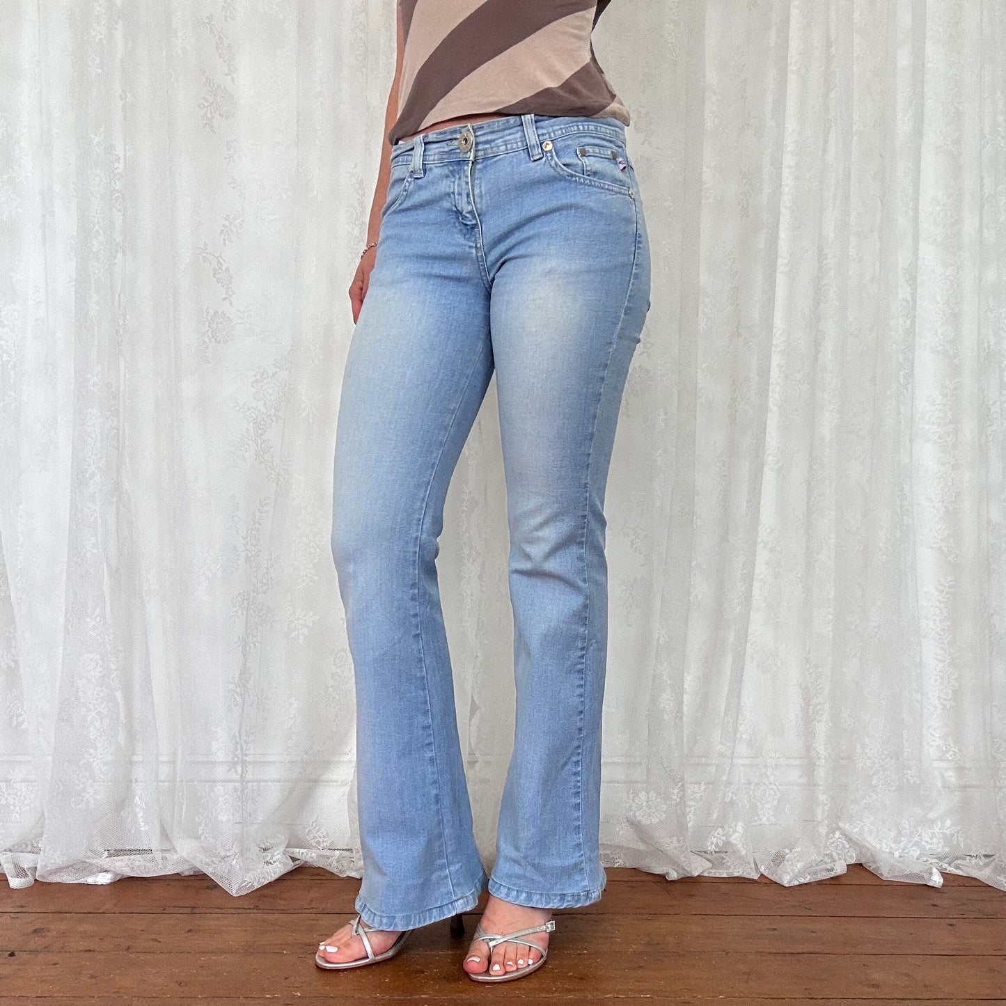 vintage 00s light wash denim flared jeans