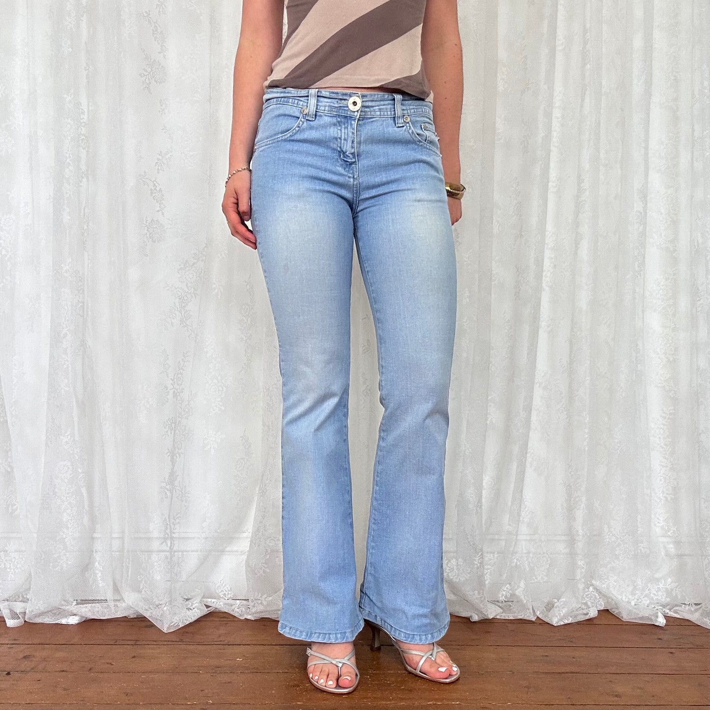 vintage 00s light wash denim flared jeans