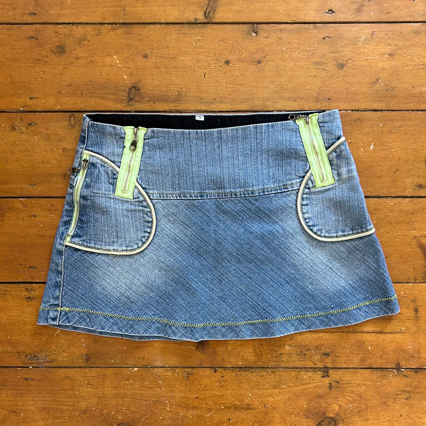 vintage 00s denim a line mini skirt with green zip detail