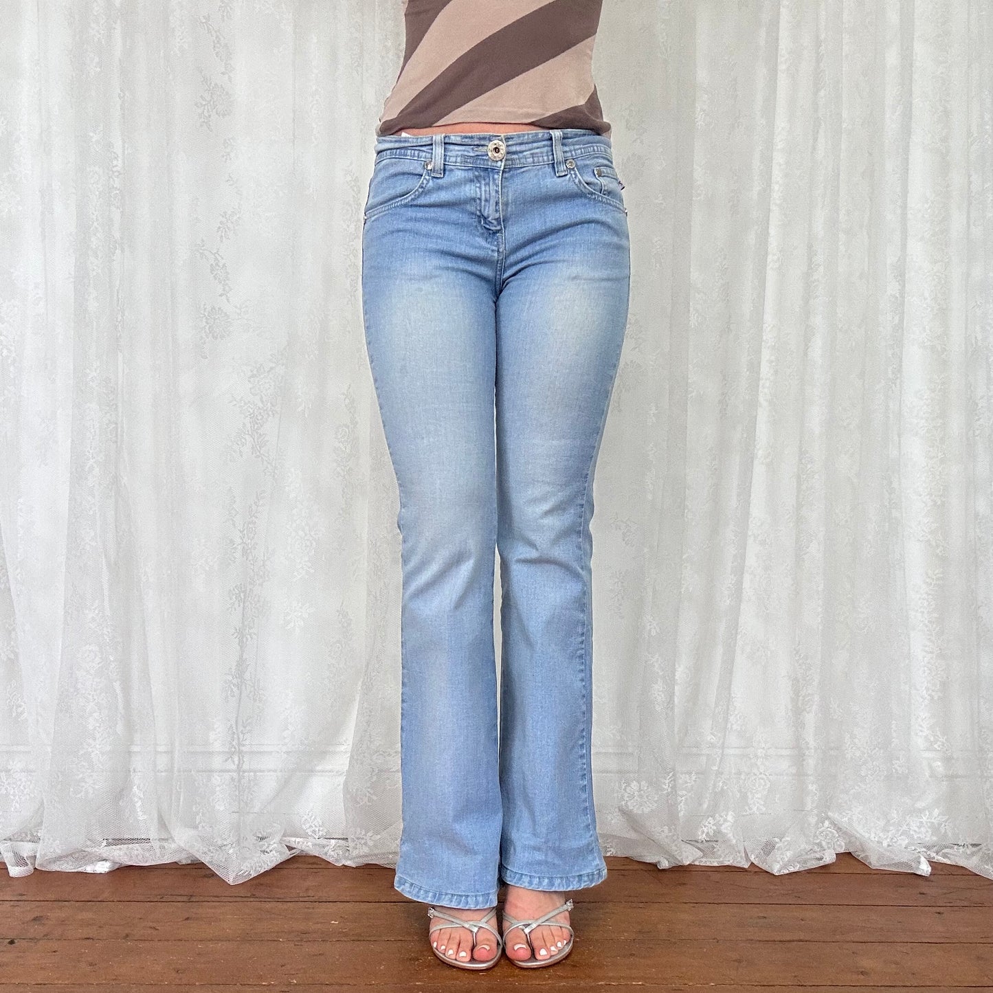 vintage 00s light wash denim flared jeans