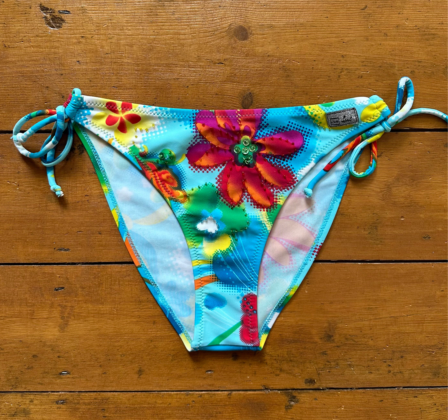vintage 00s striped bikini top and beaded floral bottoms
