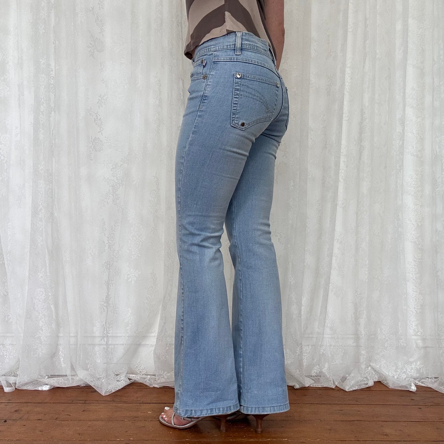 vintage 00s light wash denim flared jeans